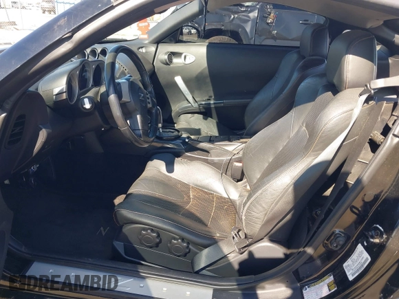 2004 Nissan 350Z Touring with VIN JN1AZ34D94M102990, listed as a IAAI auction lot 41830661 with 107,520 mi miles. Bid and sale history available at carsss.com. Image 8.