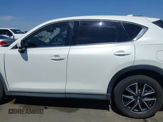 2018 Mazda CX-5 Grand Touring с VIN JM3KFADM7J0373815, выставлен на аукционе IAAI как лот 42500311 с пробегом 106 354 миль миль и . История ставок и продаж доступна на DreamBid. Изображение 14.