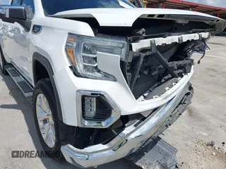 2019 GMC Sierra 1500 SLT z VIN 3GTP8DED7KG268973, wystawiony jako IAAI lot #42224064 z przebiegiem 98 871 mil mil oraz . Historia ofert i sprzedaży dostępna na DreamBid. Obrazek 19.