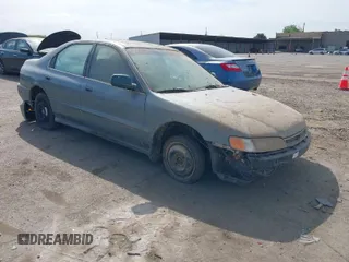 1996 Honda Accord EX w/Leather with VIN 1HGCD5666TA055580, listed as a IAAI auction lot 42021014 with 300,191 mi miles. Bid and sale history available at carsss.com. Image 1.