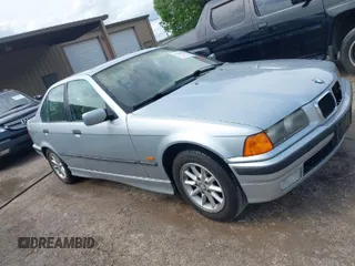 1998 BMW 3 Series 318i with VIN WBACC9322WEE60522, listed as a IAAI auction lot 41944303 with 226,799 mi miles. Bid and sale history available at carsss.com. Image 1.