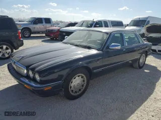 1999 Jaguar XJ with VIN SAJKX6049XC853940, listed as a Copart auction lot 74581244 with 0 mi miles and Salvage Title. Bid and sale history available at carsss.com. Image 1.