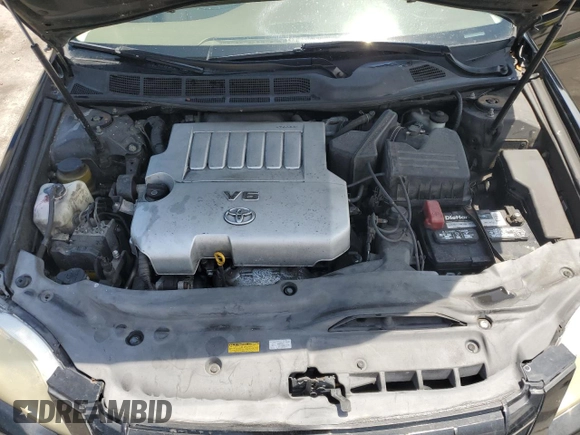 2005 Toyota Avalon XL z VIN 4T1BK36B05U022928, wystawiony jako Copart lot #59137785 z przebiegiem 146 854 mil mil oraz Szkoda całkowita • Salvage title. Historia ofert i sprzedaży dostępna na DreamBid. Obrazek 11.