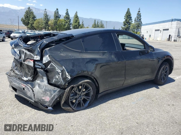 2024 Tesla Model Y Long Range with VIN 7SAYGDEE0RF123793, listed as a Copart auction lot 57177305 with 20,053 mi miles and Salvage title. Bid and sale history available at DreamBid. Image 3.