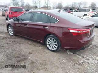 2015 Toyota Avalon Limited with VIN 4T1BK1EB7FU167777, listed as a IAAI auction lot 41457339 with 98,239 mi miles and . Bid and sale history available at DreamBid. Image 3.
