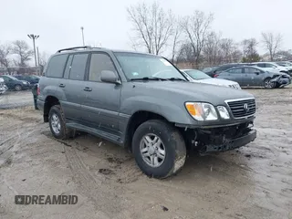 2000 Lexus LX with VIN JT6HT00W8Y0092556, listed as a IAAI auction lot 41727615 with 156,262 mi miles. Bid and sale history available at carsss.com. Image 1.