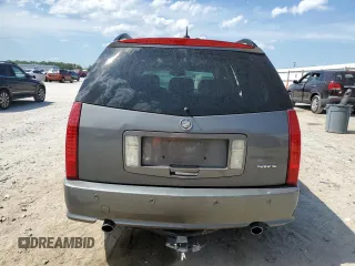 2004 Cadillac SRX z VIN 1GYEE637540179445, wystawiony jako Copart lot #58172235 z przebiegiem 207 598 mil mil oraz Szkody całkowita. Historia ofert i sprzedaży dostępna na DreamBid. Obrazek 6.