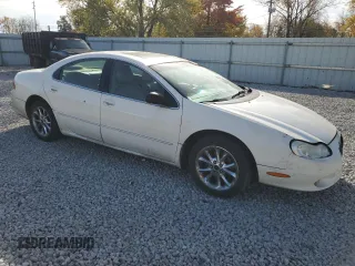 2000 Chrysler LHS z VIN 2C3HC56G4YH292405, wystawiony jako Copart lot #78263134 z przebiegiem 73 468 mil mil oraz Tytuł czysty. Historia ofert i sprzedaży dostępna na DreamBid. Obrazek 4.