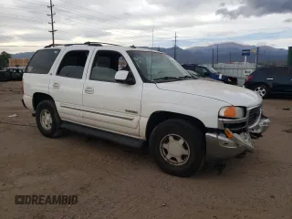 2003 GMC Yukon SLE with VIN 1GKEK13T43R205384, listed as a Copart auction lot 76916664 with 258,551 mi miles and Salvage Title. Bid and sale history available at carsss.com. Image 4.