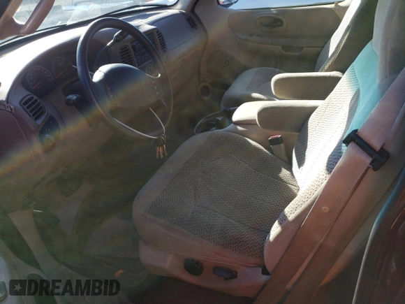 2000 Ford F-150 XL with VIN 1FTZX1726YKB41994, listed as a Copart auction lot 69300034 with Not provided miles and Salvage title. Bid and sale history available at DreamBid. Image 7.