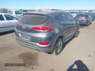 2018 Hyundai Tucson SEL z VIN KM8J33A42JU681606, wystawiony jako IAAI lot #41067514 z przebiegiem 150 119 mil mil oraz . Historia ofert i sprzedaży dostępna na DreamBid. Obrazek 4.