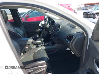 2021 Jeep Cherokee Trailhawk with VIN 1C4PJMBX1MD145169, listed as a IAAI auction lot 42340464 with 50,925 mi miles and . Bid and sale history available at DreamBid. Image 5.