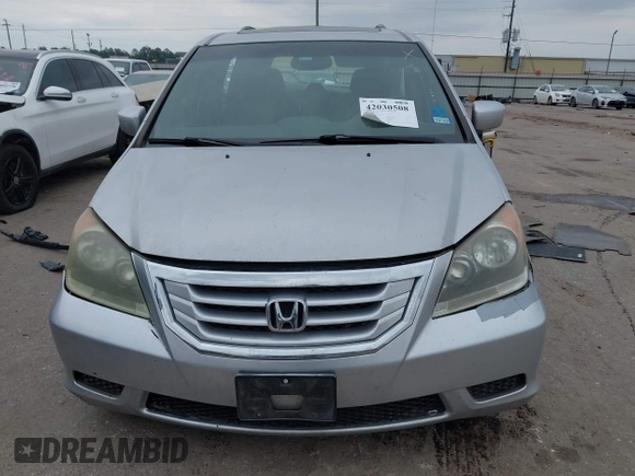 2010 Honda Odyssey EX-L с VIN 5FNRL3H77AB098271, выставлен на аукционе IAAI как лот 42030508 с пробегом 204 474 миль миль и . История ставок и продаж доступна на DreamBid. Изображение 12.