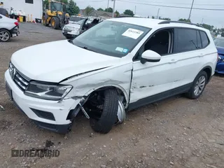 2020 Volkswagen Tiguan S with VIN 3VV0B7AX0LM140910, listed as a IAAI auction lot 42622385 with 80,998 mi miles and . Bid and sale history available at DreamBid. Image 2.