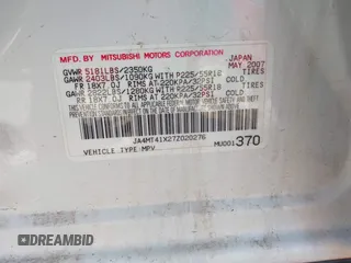 2007 Mitsubishi Outlander XLS z VIN JA4MT41X27Z020276, wystawiony jako IAAI lot #42348742 z przebiegiem 75 715 mil mil oraz . Historia ofert i sprzedaży dostępna na DreamBid. Obrazek 9.