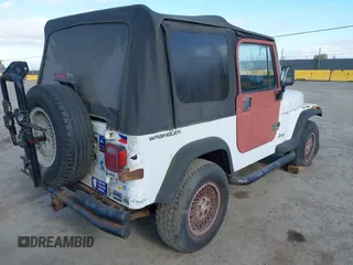 1995 Jeep Wrangler S with VIN 1J4FY19P6SP210468, listed as a IAAI auction lot 41882009 with 133,705 mi miles. Bid and sale history available at carsss.com. Image 4.
