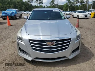 2016 Cadillac CTS Luxury Collection RWD z VIN 1G6AR5SX6G0112770, wystawiony jako Copart lot #60835505 z przebiegiem 13 835 mil mil oraz Czysty tytuł • Clean title. Historia ofert i sprzedaży dostępna na DreamBid. Obrazek 5.