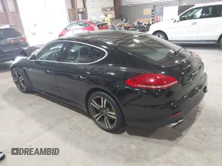 2016 Porsche Panamera S E-Hybrid z VIN WP0AD2A74GL040039, wystawiony jako IAAI lot #42411042 z przebiegiem 60 616 mil mil oraz . Historia ofert i sprzedaży dostępna na DreamBid. Obrazek 3.