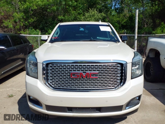 2015 GMC Yukon Denali with VIN 1GKS1CKJ8FR575730, listed as a IAAI auction lot 42048050 with 113,077 mi miles. Bid and sale history available at carsss.com. Image 13.