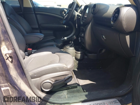 2014 MINI Countryman S with VIN WMWZC3C5XEWP27221, listed as a IAAI auction lot 41957817 with 112,353 mi miles and . Bid and sale history available at DreamBid. Image 5.