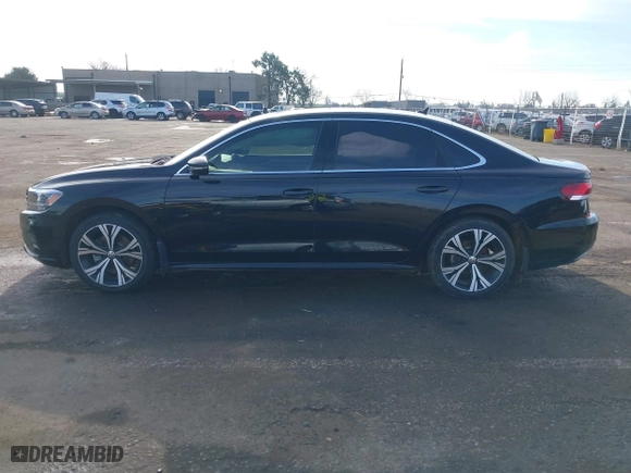 2021 Volkswagen Passat 2.0T SE with VIN 1VWSA7A39MC015718, listed as a IAAI auction lot 41233666 with 28,142 mi miles. Bid and sale history available at carsss.com. Image 14.