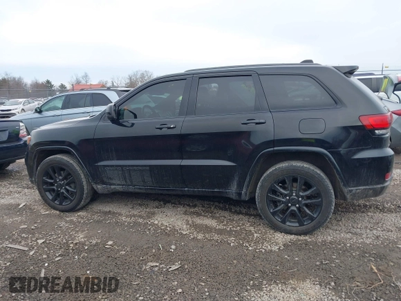 2017 Jeep Grand Cherokee Laredo with VIN 1C4RJFAG9HC882251, listed as a IAAI auction lot 41696710 with 129,627 mi miles and . Bid and sale history available at DreamBid. Image 14.