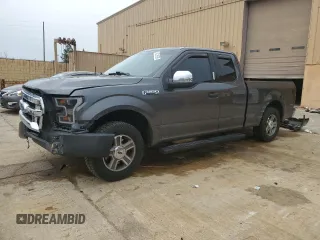2015 Ford F-150 XL with VIN 1FTEX1C8XFFA48801, listed as a Copart auction lot 43728595 with 144,829 mi miles and Salvage Title. Bid and sale history available at carsss.com. Image 1.