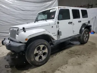 2018 Jeep Wrangler Unlimited Altitude with VIN 1C4BJWEG3JL823567, listed as a Copart auction lot 47946955 with 128,164 mi miles and Salvage title. Bid and sale history available at DreamBid. Image 1.