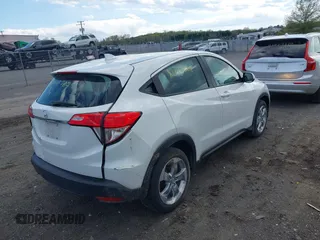 2021 Honda HR-V LX with VIN 3CZRU5H37MM718648, listed as a IAAI auction lot 42005588 with 67,225 mi miles and . Bid and sale history available at DreamBid. Image 4.