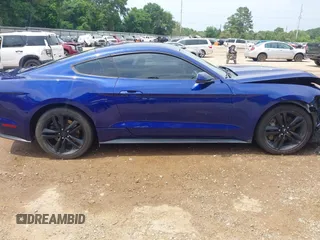 2015 Ford Mustang EcoBoost with VIN 1FA6P8TH5F5351686, listed as a IAAI auction lot 42290571 with 129,546 mi miles and . Bid and sale history available at DreamBid. Image 14.