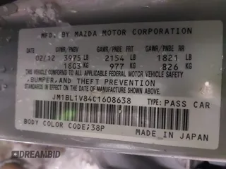 2012 Mazda 3 i Touring with VIN JM1BL1V84C1608638, listed as a IAAI auction lot 41533492 with 132,923 mi miles. Bid and sale history available at carsss.com. Image 9.