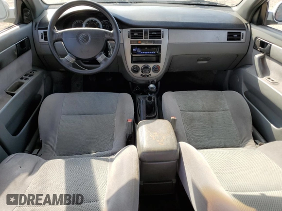 2006 Suzuki Forenza z VIN KL5JD56Z66K299816, wystawiony jako Copart lot #81893914 z przebiegiem 156 416 mil mil oraz Szkoda całkowita • Salvage title. Historia ofert i sprzedaży dostępna na DreamBid. Obrazek 8.
