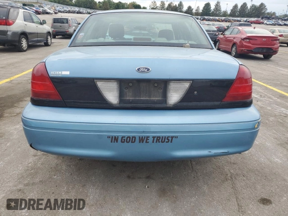 2004 Ford Police Interceptor Base w/3.27 Axle with VIN 2FAFP71W44X176595, listed as a Copart auction lot 72642164 with 136,019 mi miles and Salvage title. Bid and sale history available at DreamBid. Image 6.