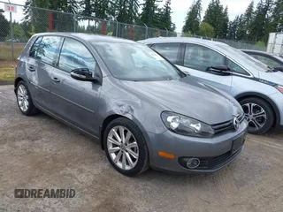 2012 Volkswagen Golf TDI z VIN WVWNM7AJ8CW139028, wystawiony jako IAAI lot #42421116 z przebiegiem 60 776 mil mil oraz . Historia ofert i sprzedaży dostępna na DreamBid. Obrazek 1.