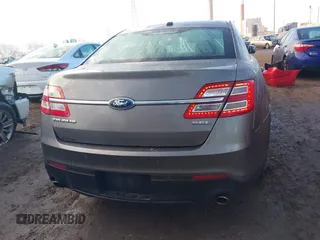 2013 Ford Taurus SEL z VIN 1FAHP2E84DG193376, wystawiony jako IAAI lot #41661721 z przebiegiem 136 341 mil mil oraz . Historia ofert i sprzedaży dostępna na DreamBid. Obrazek 16.
