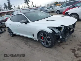 2021 Kia Stinger GT2 with VIN KNAE55LC5M6097982, listed as a IAAI auction lot 41568157 with 57,836 mi miles. Bid and sale history available at carsss.com. Image 1.