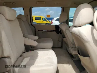 2008 Hyundai Entourage GLS z VIN KNDMC233986045053, wystawiony jako Copart lot #73639094 z przebiegiem 168 228 mil mil oraz Nie do naprawy. Historia ofert i sprzedaży dostępna na DreamBid. Obrazek 11.