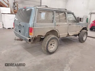 1998 Jeep Cherokee Sport with VIN 1J4FJ68S5WL284937, listed as a IAAI auction lot 41984490 with 259,716 mi miles and . Bid and sale history available at DreamBid. Image 4.