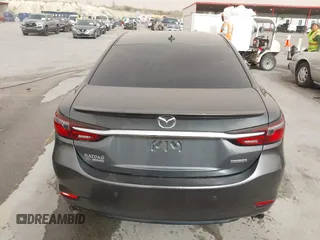 2020 Mazda 6 Signature with VIN JM1GL1XY6L1522900, listed as a IAAI auction lot 41724818 with 62,846 mi miles and . Bid and sale history available at DreamBid. Image 16.