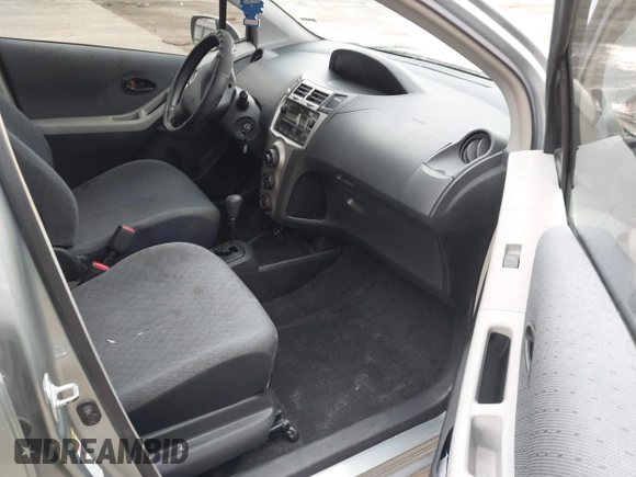2010 Toyota Yaris with VIN JTDKT4K33A5314776, listed as a IAAI auction lot 41570383 with 167,428 mi miles. Bid and sale history available at carsss.com. Image 5.