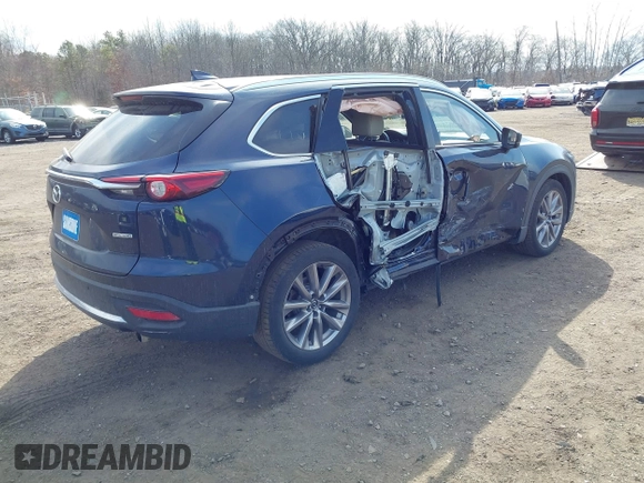 2021 Mazda CX-9 Grand Touring with VIN JM3TCBDY7M0540359, listed as a IAAI auction lot 41711366 with 47,391 mi miles and . Bid and sale history available at carsss.com. Image 4.