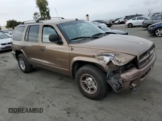 2000 Dodge Durango z VIN 1B4HR28Y4YF187411, wystawiony jako Copart lot #79060184 z przebiegiem 275 571 mil mil oraz Szkoda całkowita • Salvage title. Historia ofert i sprzedaży dostępna na DreamBid. Obrazek 4.