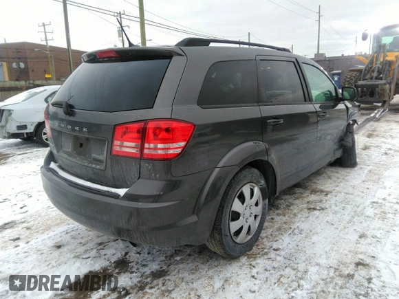 2016 Dodge Journey SE with VIN 3C4PDCAB0GT164835, listed as a IAAI auction lot 41093557 with 124,866 mi miles and . Bid and sale history available at DreamBid. Image 4.