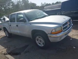 2003 Dodge Dakota SLT with VIN 1D7HL48N83S236590, listed as a IAAI auction lot 41796103 with 221,667 mi miles. Bid and sale history available at carsss.com. Image 1.