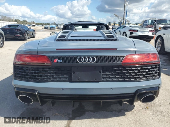 2020 Audi R8 z VIN WUAVECFX5L7901778, wystawiony jako Copart lot #74736714 z przebiegiem Nie podano mil oraz Nie do naprawy • Non repairable. Historia ofert i sprzedaży dostępna na DreamBid. Obrazek 6.