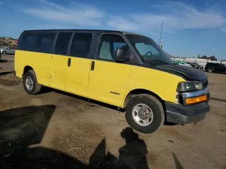2004 Chevrolet Express Passenger with VIN 1GAHG39U641193334, listed as a Copart auction lot 74011934 with 330,603 mi miles and Salvage Title. Bid and sale history available at carsss.com. Image 4.
