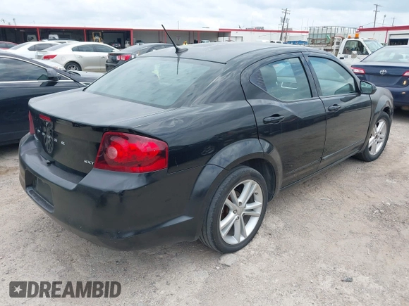 2013 Dodge Avenger SXT with VIN 1C3CDZCB8DN590965, listed as a IAAI auction lot 42154596 with 173,070 mi miles and . Bid and sale history available at carsss.com. Image 4.