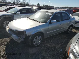 2001 Mazda Protege LX with VIN JM1BJ225410441741, listed as a Copart auction lot 42136175 with 110,677 mi miles and Salvage Title. Bid and sale history available at carsss.com. Image 1.