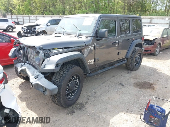 2019 Jeep Wrangler Unlimited Sport S with VIN 1C4HJXDG2KW516571, listed as a IAAI auction lot 42043223 with 58,131 mi miles and . Bid and sale history available at DreamBid. Image 2.