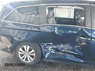 2014 Honda Odyssey EX-L with VIN 5FNRL5H66EB080708, listed as a IAAI auction lot 42067390 with 175,916 mi miles and . Bid and sale history available at carsss.com. Image 6.